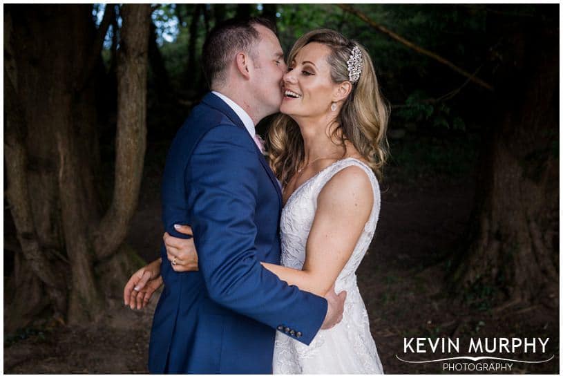 bride and groom laughing